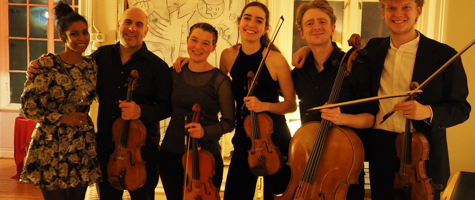 Young Musethica musicians with mentor Avri Levitan